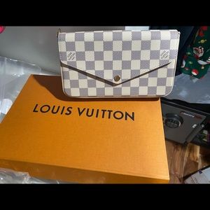 Brand new! In box with dustbag